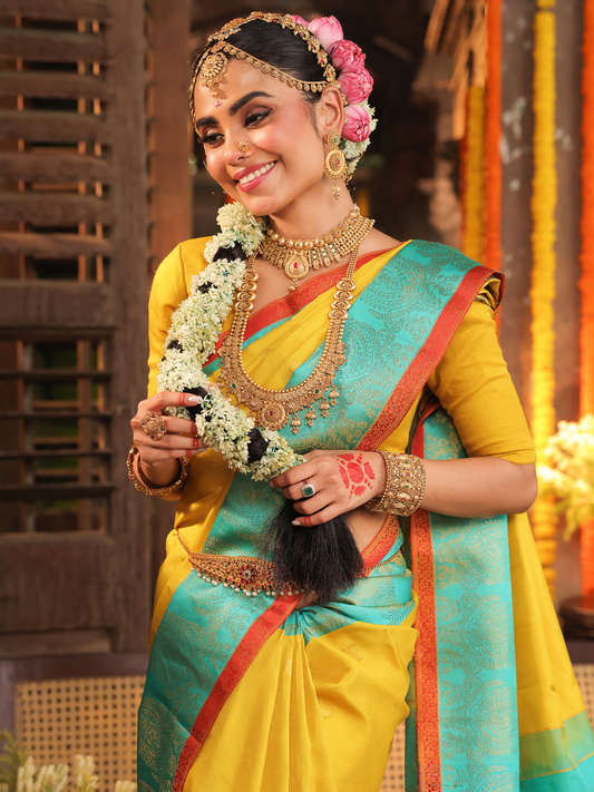 Nimbaka  -  Lemon yellow silk with floral zari and traditional pallu