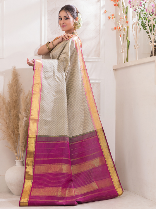 Dhumra  -  Smoky black silk with antique gold border and zari highlights