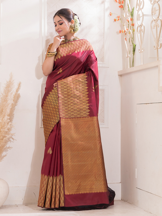 Manjari  -  Ruby red silk with intricate golden zari and festive tone