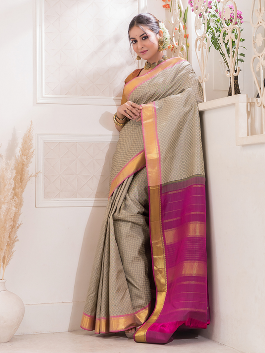 Dhumra  -  Smoky black silk with antique gold border and zari highlights