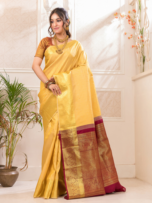 Swarna  -  Ivory silk with golden floral vine and temple border