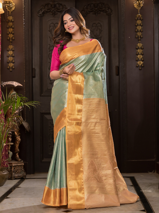 Manjusha  -  Teal green silk with golden temple pallu