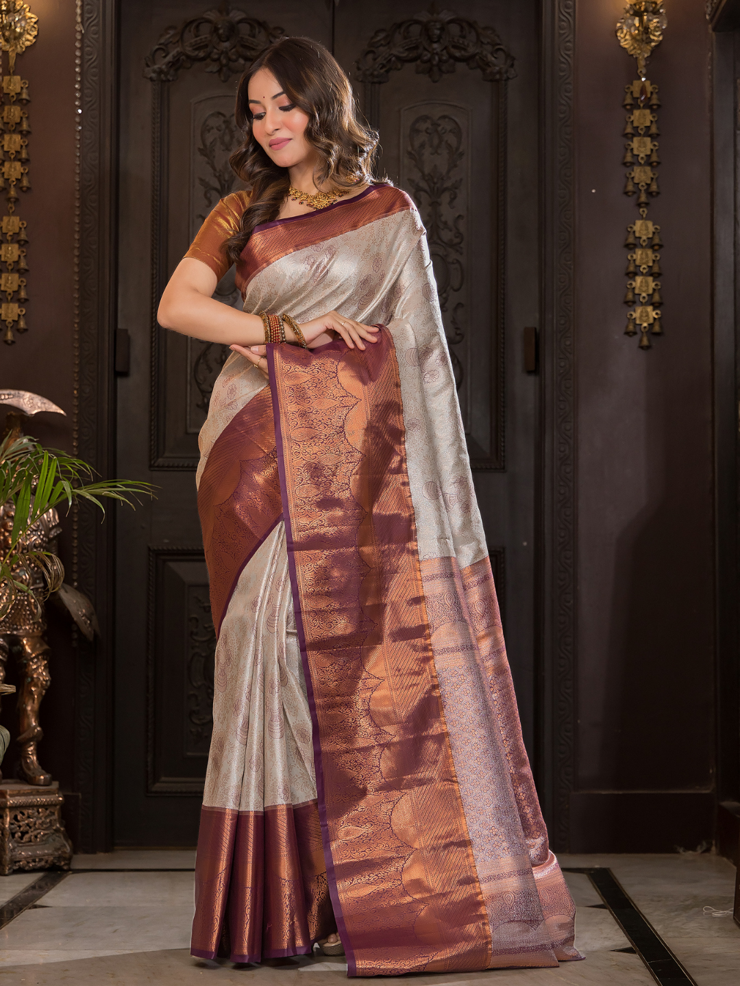 Shaivalya  -  Thyme green silk with contrasting zari lotus border