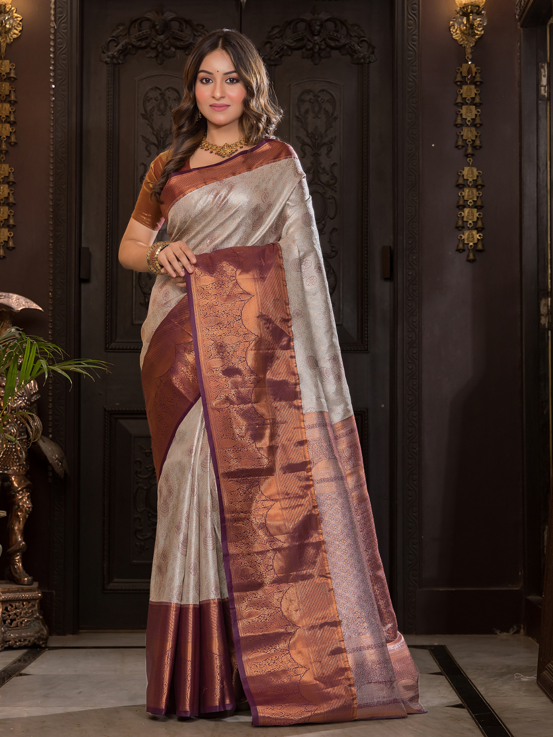 Shaivalya  -  Thyme green silk with contrasting zari lotus border