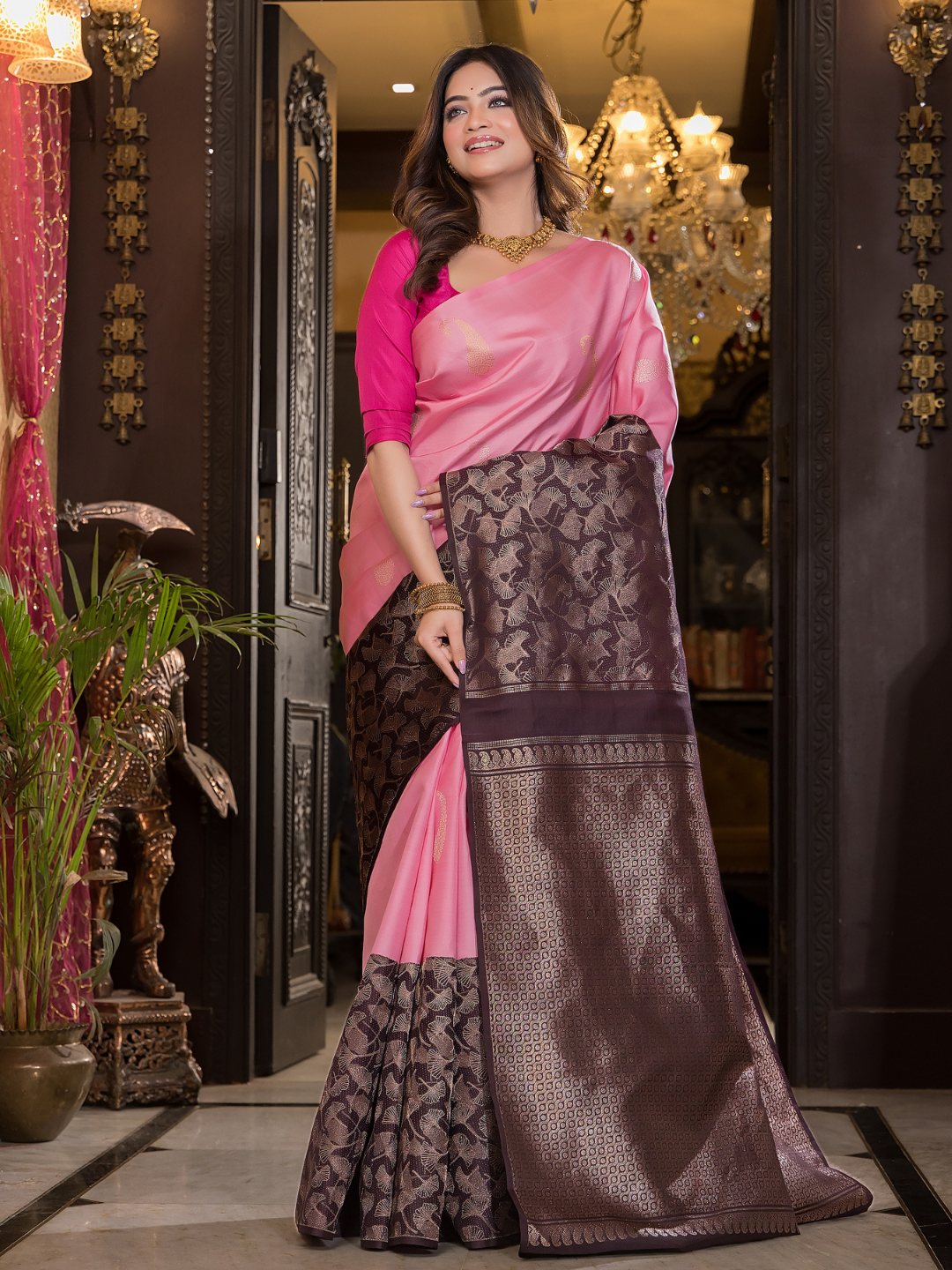 Mridulya - Delicate pink weave with floral zari accents