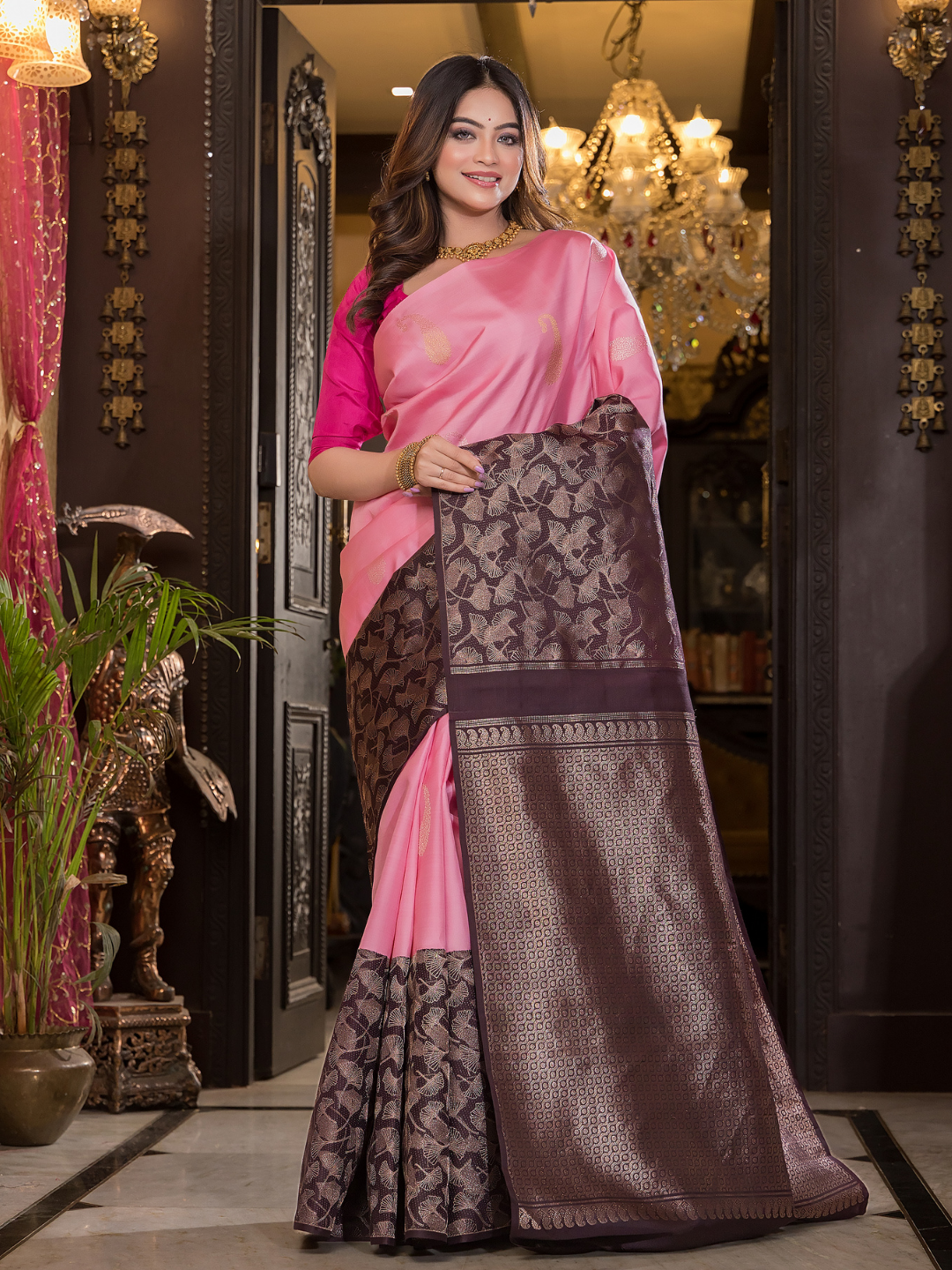 Mridulya - Delicate pink weave with floral zari accents