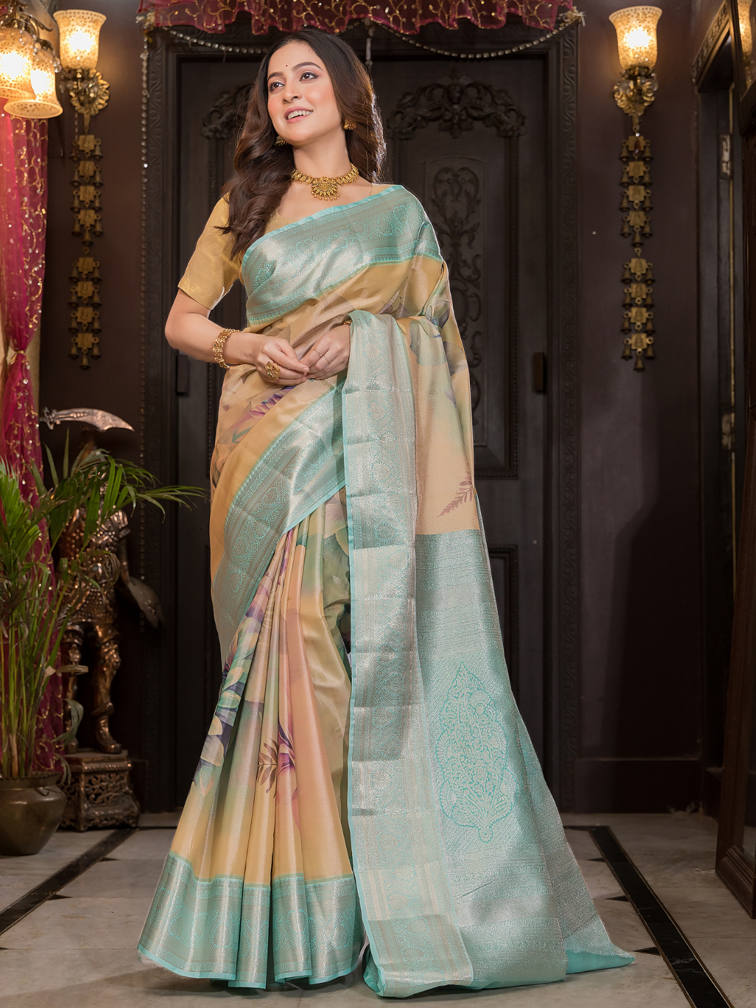 Varnitha - Earth-toned tan silk with sapphire blue zari edge