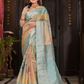 Varnitha - Earth-toned tan silk with sapphire blue zari edge