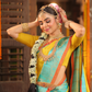Nimbaka  -  Lemon yellow silk with floral zari and traditional pallu