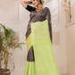 Tamasa  -  Smoky black silk with antique gold zari pallu