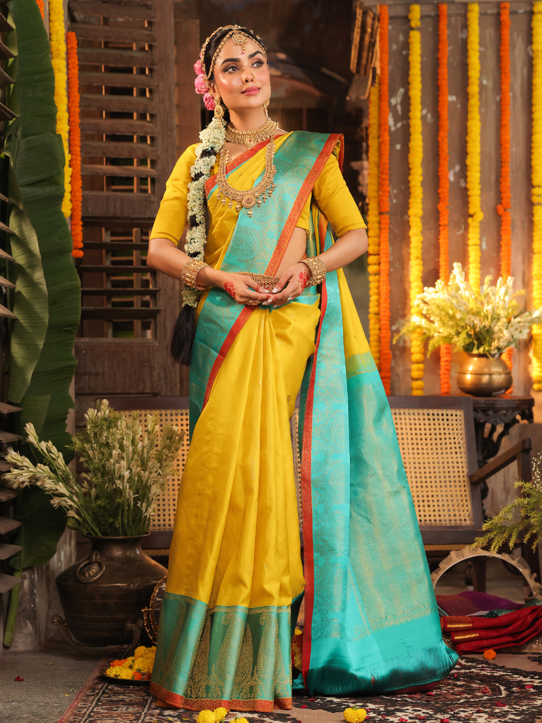 Nimbaka  -  Lemon yellow silk with floral zari and traditional pallu