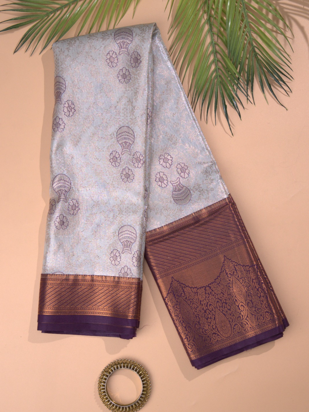 Shaivalya  -  Thyme green silk with contrasting zari lotus border