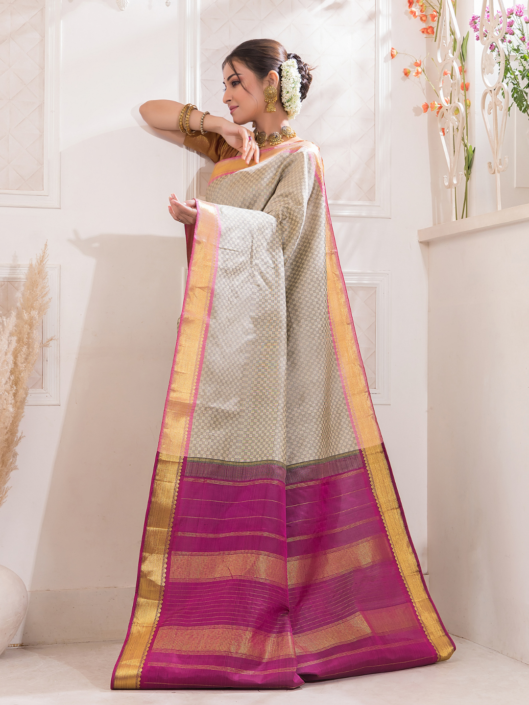 Dhumra  -  Smoky black silk with antique gold border and zari highlights