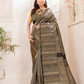Hemapatra - Golden khaki green saree with vine motifs and Zari