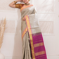 Dhumra  -  Smoky black silk with antique gold border and zari highlights
