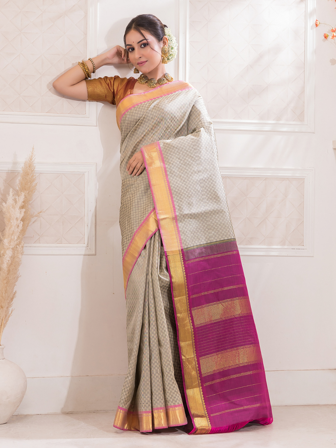 Dhumra  -  Smoky black silk with antique gold border and zari highlights