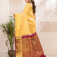 Swarna  -  Ivory silk with golden floral vine and temple border
