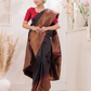 Kaalindi - Midnight Black silk with temple border and zari breeze