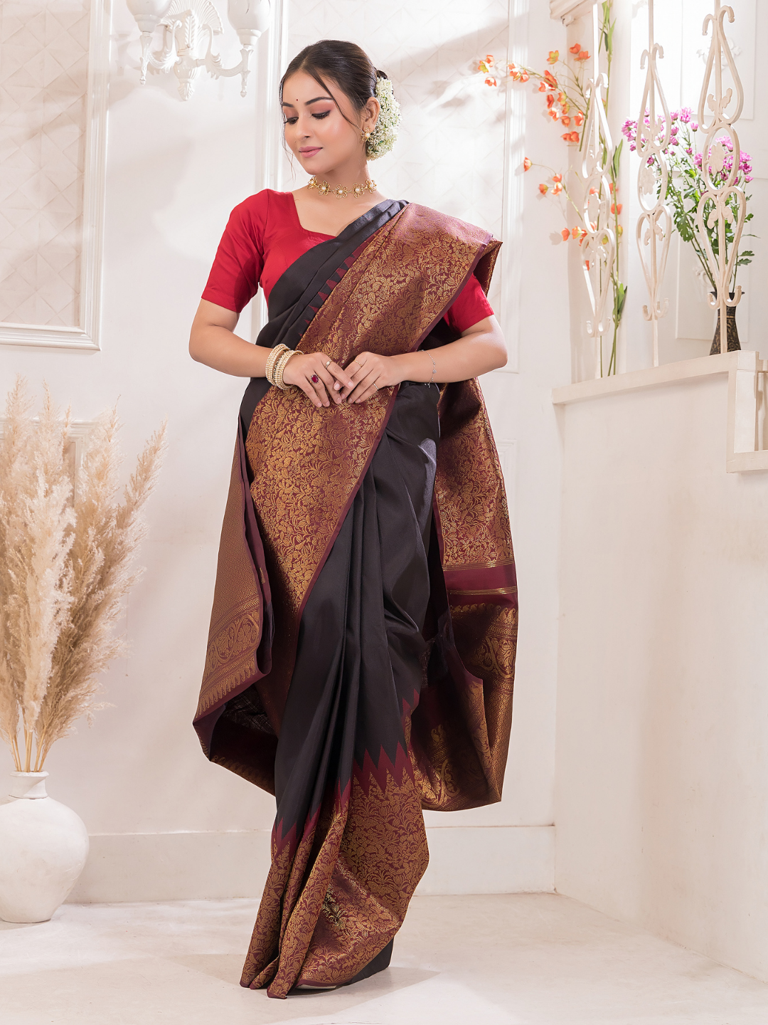 Kaalindi - Midnight Black silk with temple border and zari breeze