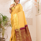Swarna  -  Ivory silk with golden floral vine and temple border