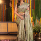 Harini Vastra - Golden Jade green silk with peacock buttas and zari elegance