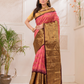Swarna  -  Ivory silk with golden floral vine and temple border