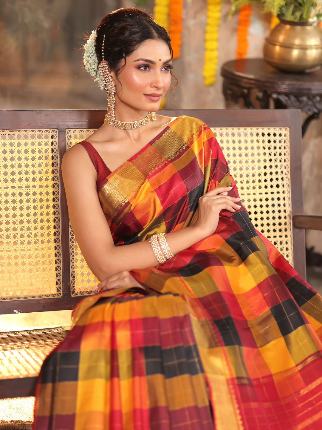 Kanakavalli - Ivory radiance drape with golden pallu and temple Zari