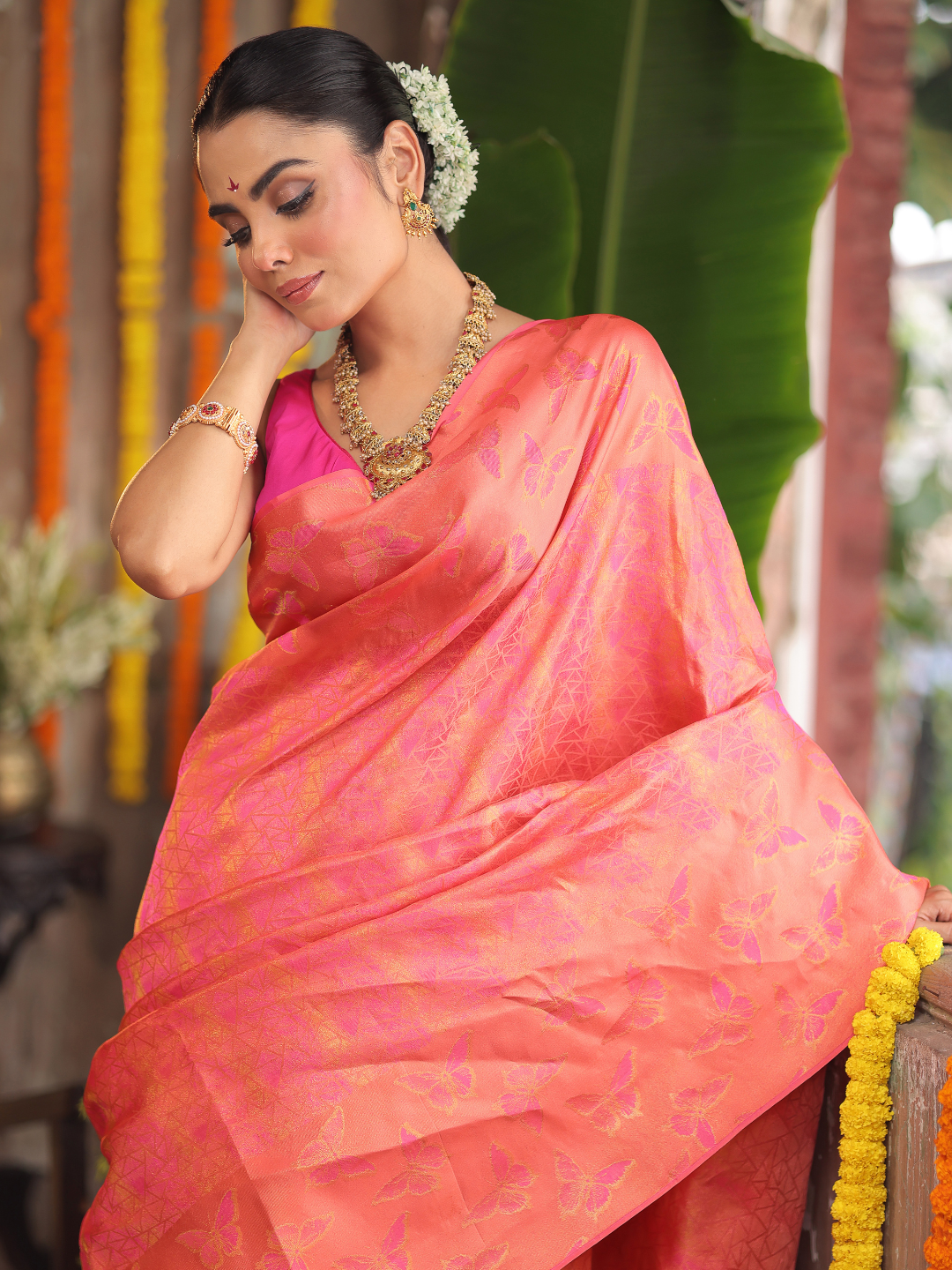 Padma Roopa - Coral lotus-toned drape with bird motifs