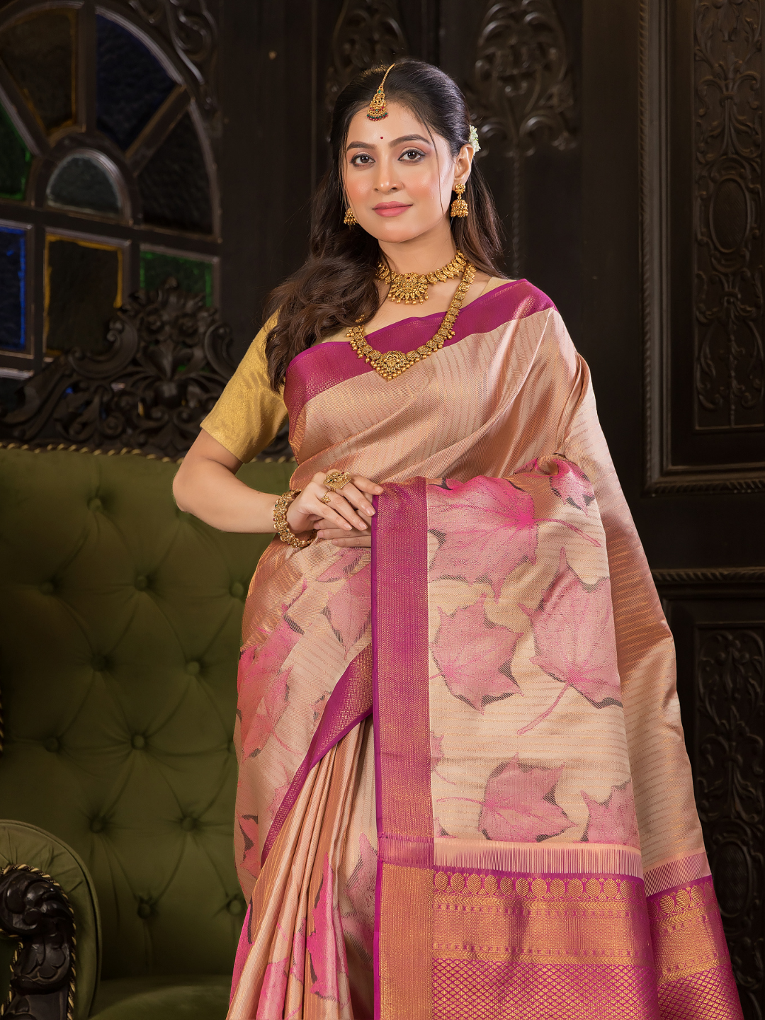 Raktika - Pink-hued silk with mayura chakra design