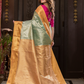 Manjusha  -  Teal green silk with golden temple pallu