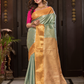 Manjusha  -  Teal green silk with golden temple pallu