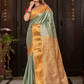 Manjusha  -  Teal green silk with golden temple pallu