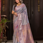 Vilasini  -  Lilac silk with blooming floral buttas and zari vines