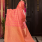 Padma Roopa - Coral lotus-toned drape with bird motifs