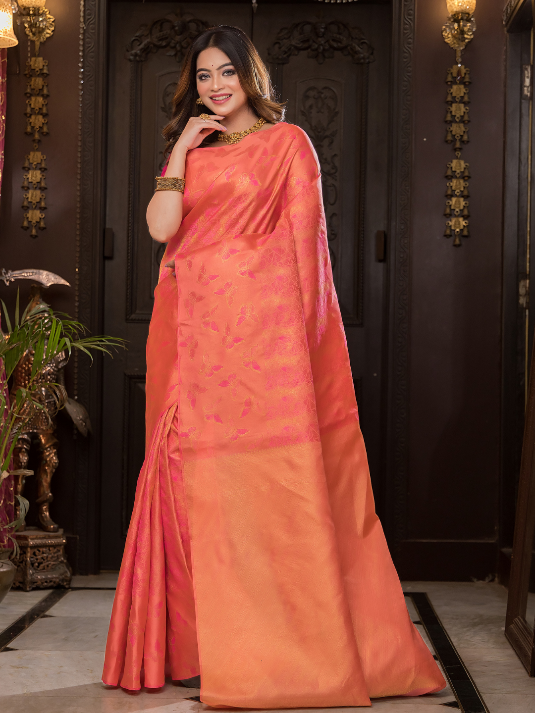 Padma Roopa - Coral lotus-toned drape with bird motifs