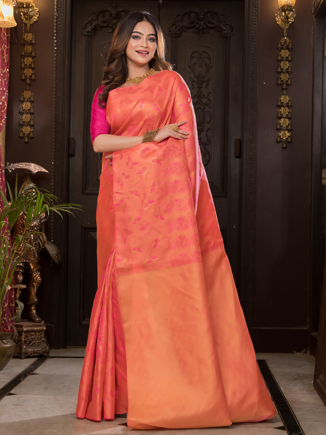 Padma Roopa - Coral lotus-toned drape with bird motifs