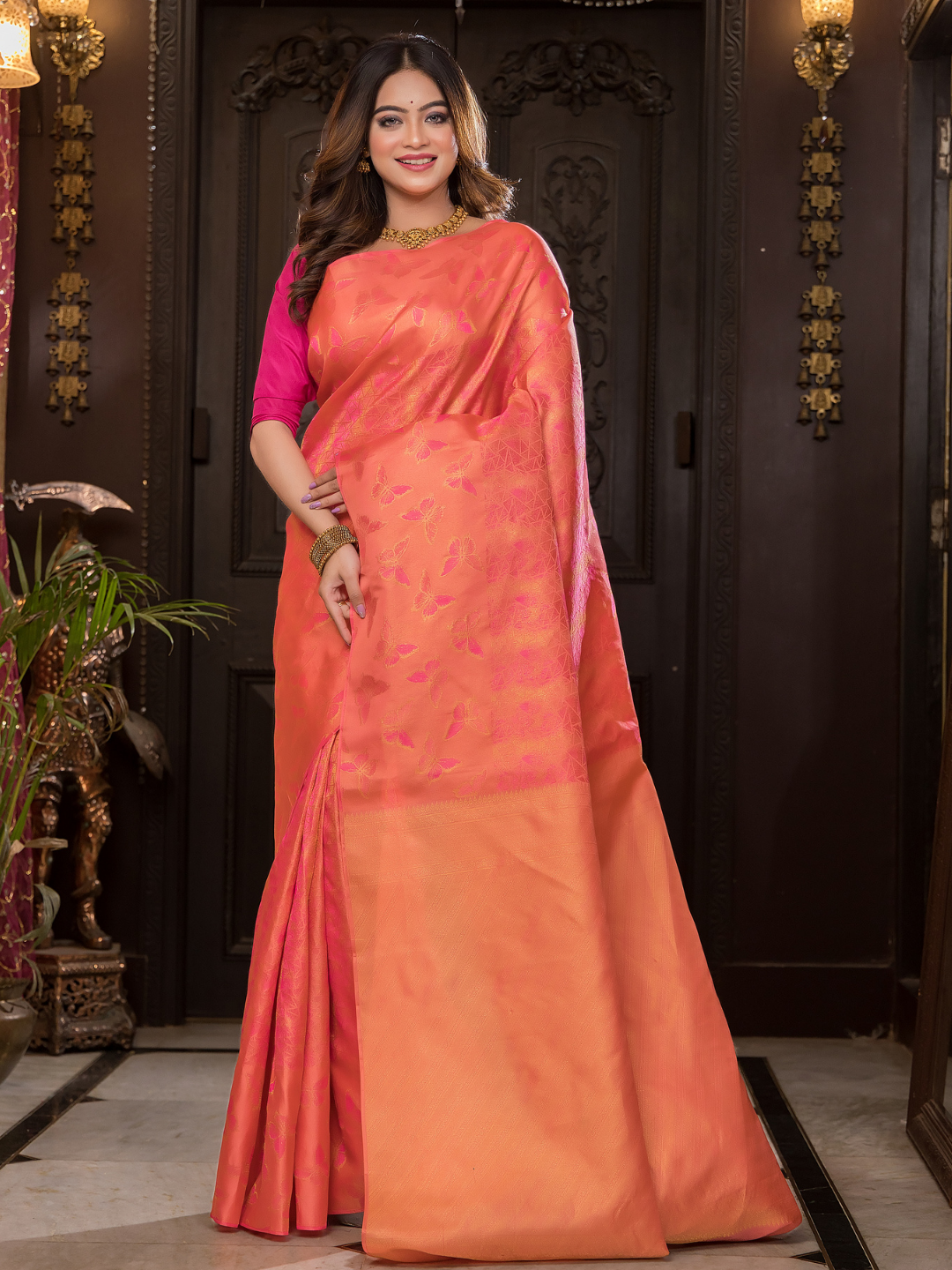 Padma Roopa - Coral lotus-toned drape with bird motifs