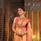 Kanaka Varnika - Golden yellow drape with rudraksha motifs